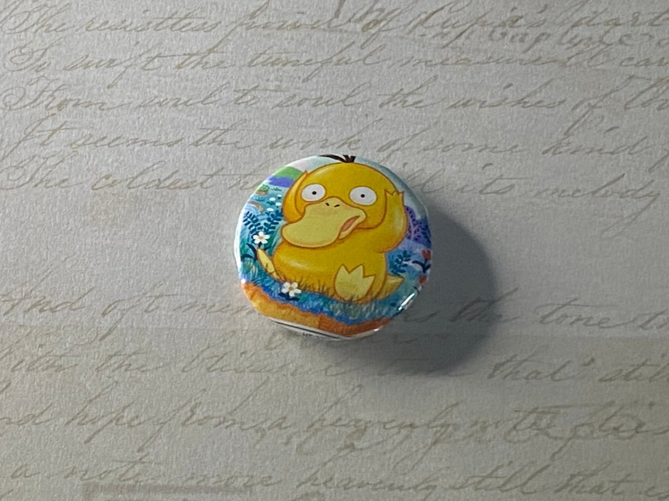 #054 Psyduck - Upcycled Pokémon Card Button Pin